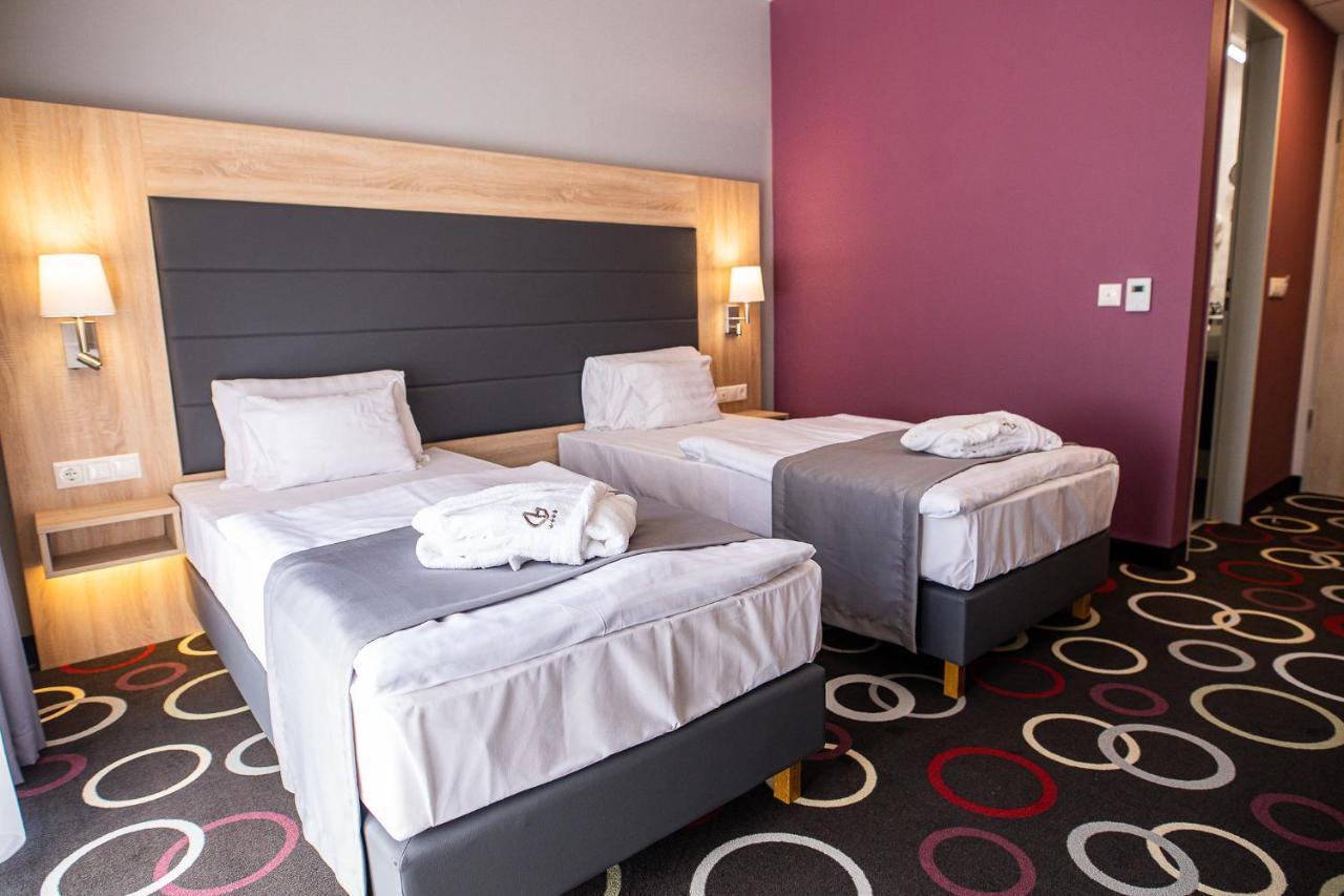 Отель Garden Wellness Es Konferencia 4*